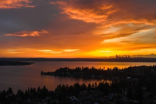 a sunset over a body of water